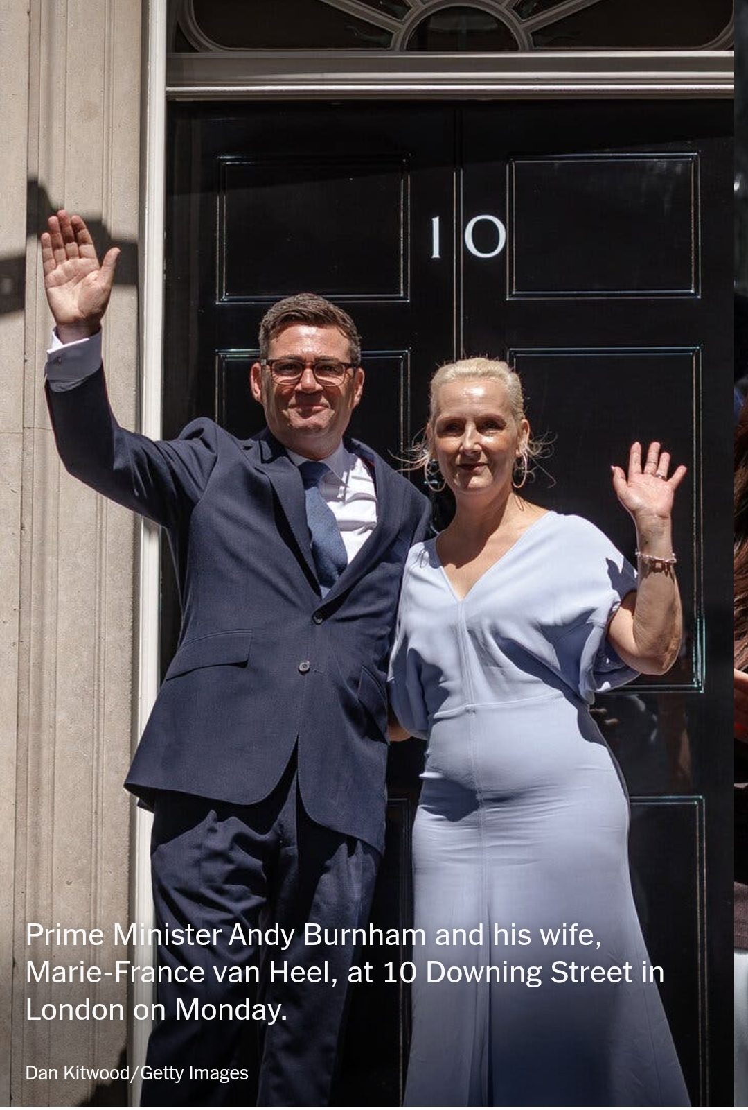 Andy Burnham and Marie-France van Heel waving outside 10 Downing Street